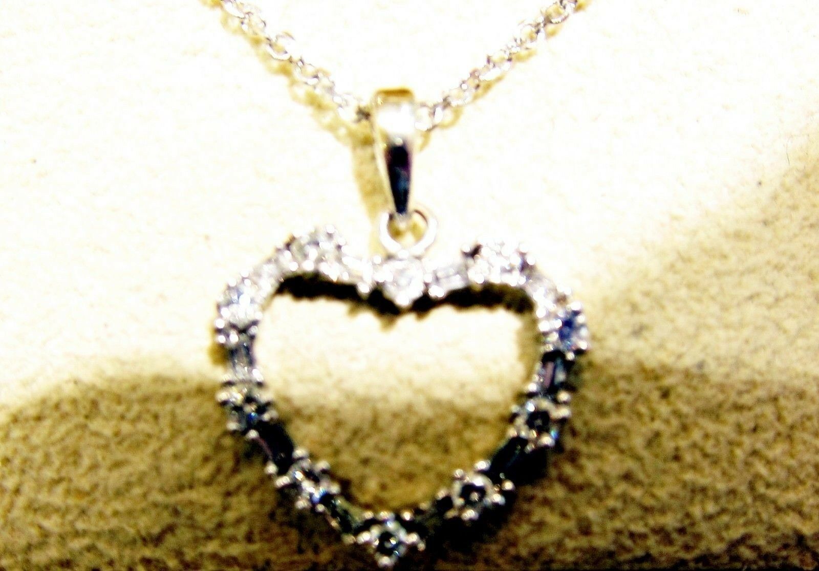 DIAMOND ROUND BRILLIANT SHAPE BAGUETTE SHAPE HEART PENDANT