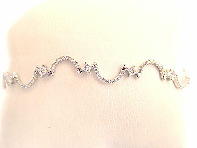 2.48 CT 11 PRINCESS SHAPE DIAMOND SET ROUND BRILLIANT SH DIAMOND SWIRL BRACELET