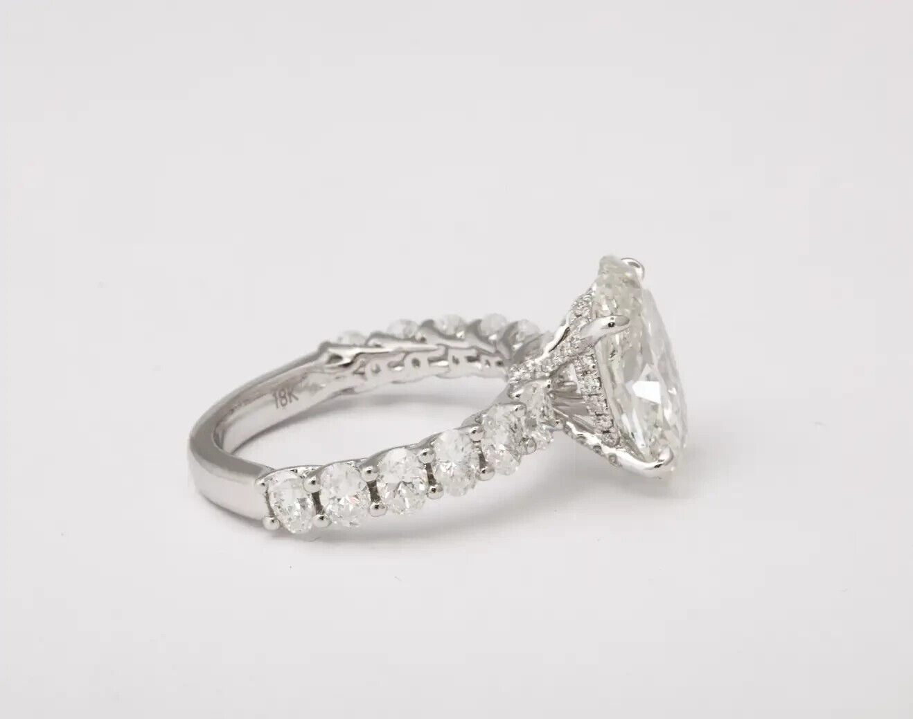 GIA certified E color SI2 4 carat Oval Diamond Engagement Ring
