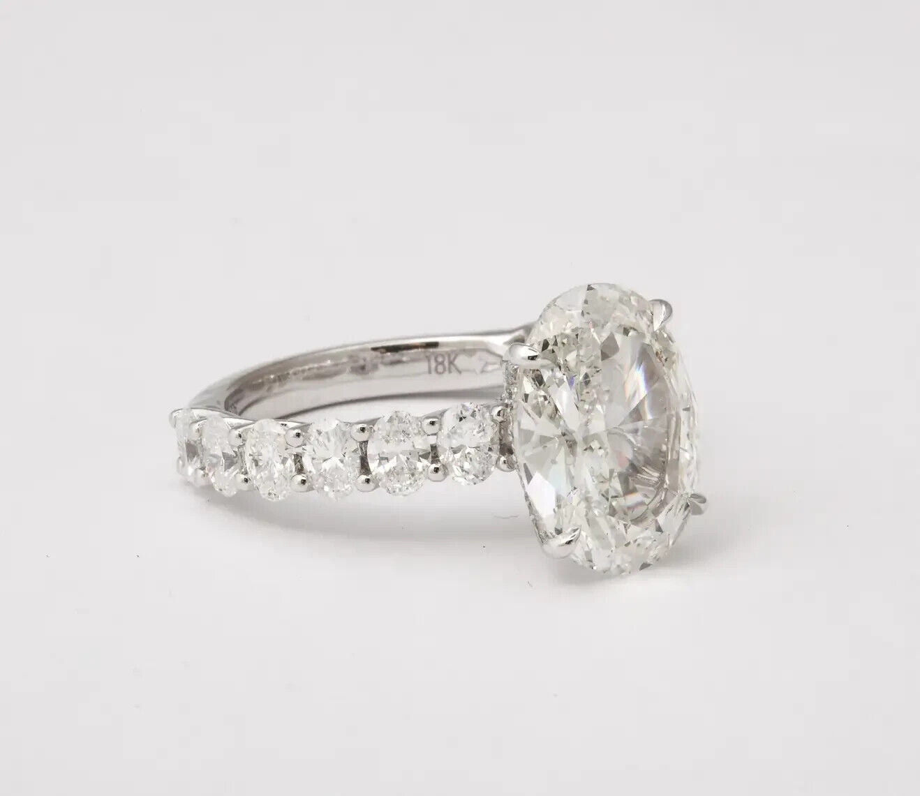 GIA certified E color SI2 4 carat Oval Diamond Engagement Ring