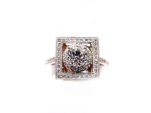 GIA CERTIFIED D:69% T:55% GIRDLE:TH TO EXTR THICK,FAC C:NONE ENGAGEMENT RING