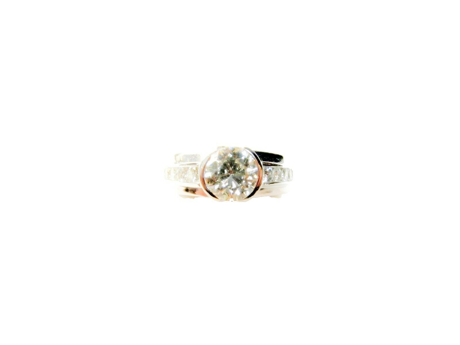 CERTIFIED ROUND BRILLIANT HALF BEZEL SET DIAMOND SIDE CHANNEL ENGAGEMENT RING