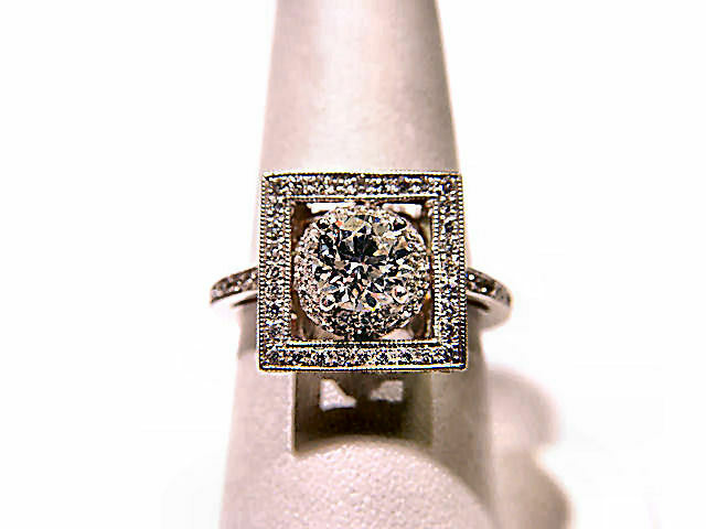 GIA CERTIFIED D:69% T:55% GIRDLE:TH TO EXTR THICK,FAC C:NONE ENGAGEMENT RING