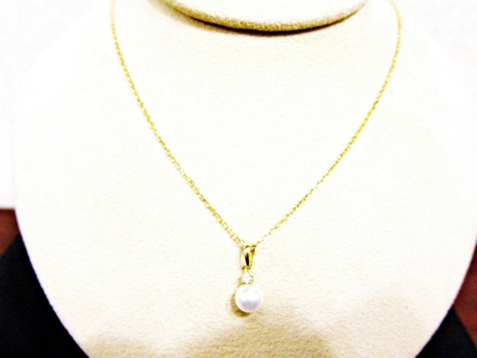 MIKIMOTO PEARL PENDANT 7.10 MM WITH ROUND DIAMOND CHAIN