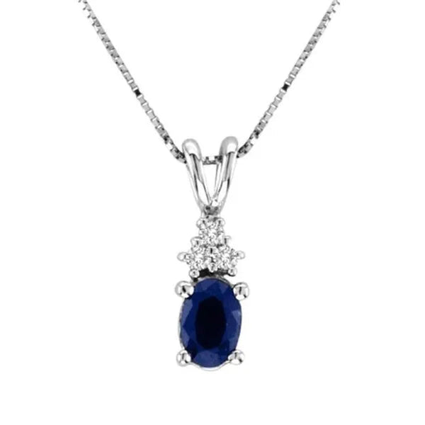 0.44 Ct. Diamond And Oval Sapphire Pendant In 14K Gold