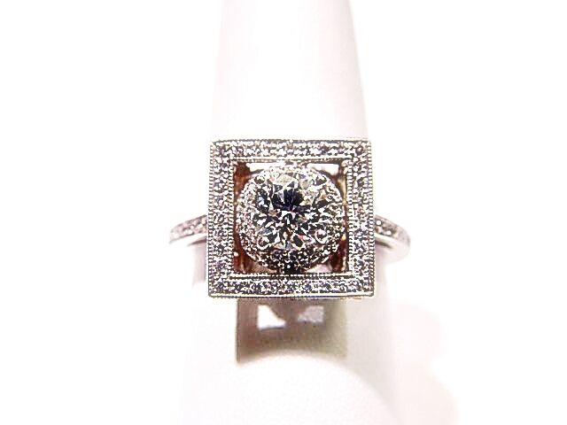 GIA CERTIFIED D:69% T:55% GIRDLE:TH TO EXTR THICK,FAC C:NONE ENGAGEMENT RING