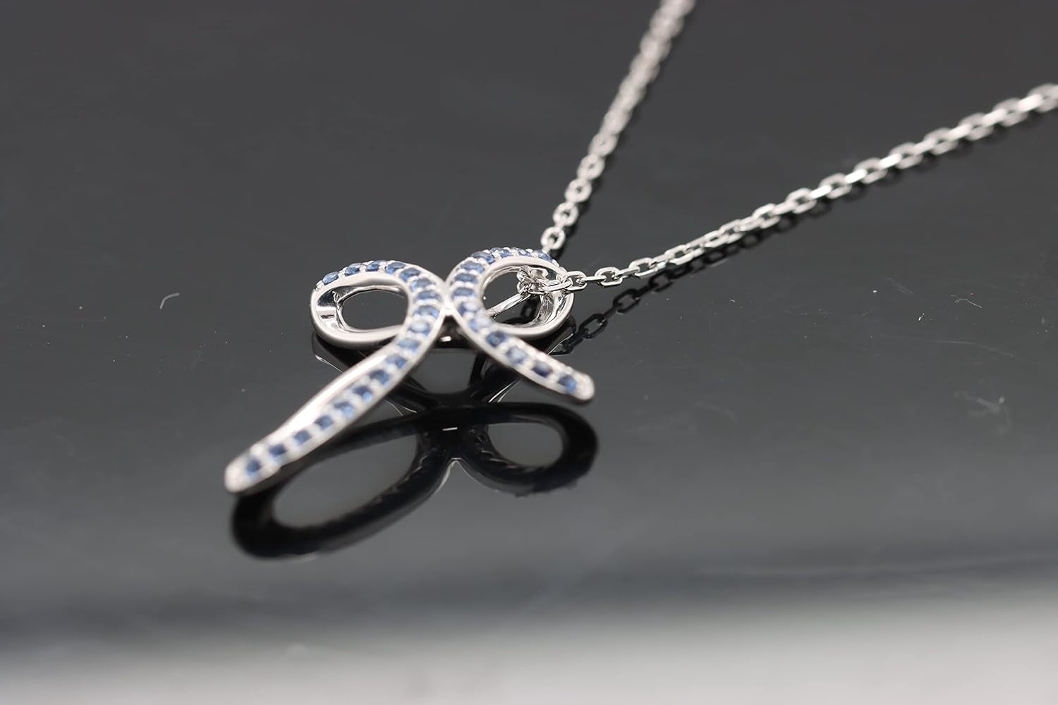 1.2MM round Cut Blue Sapphire Infinity Cross Necklace Pendant - 14K White Gold over 925 Sterling Silver Twist Cross Necklace for Women with 18" Chain (Clarity-Vvs1, Color-Blue, 0.12 Carat)